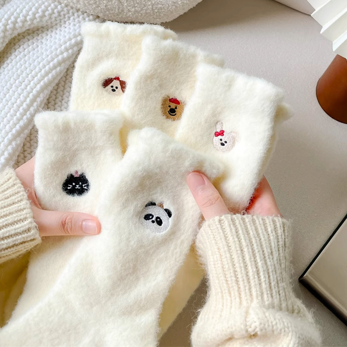 Chaque paire est décorée d’une petite tête d’animal brodée très mignonne🐶